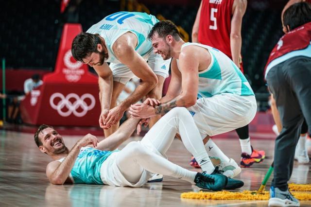 1627966033982059016.jpg db真人视讯-轻取德国锁定四强 东契奇国家队17胜0败有谁能挡?